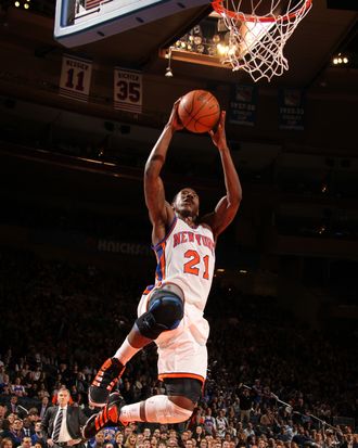 Iman Shumpert #21 of the New York Knicks goes up for a dunk against the Charlotte Bobcats during a game on January 9, 2012 at Madison Square Garden in New York City.