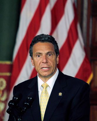 FILE - This Aug. 9, 2011 file photo shows New York Gov. Andrew Cuomo speaking during a news conference at the Capitol in Albany, N.Y. Cuomo used state aircraft for more than a dozen flights to or from his girlfriend's house where he lives following statewide tours in which he called for belt-tightening and budget cuts for schools and other services, records show. (AP Photo/Mike Groll)