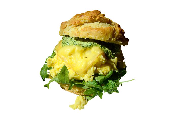 Egg-and-cheese biscuit with Spring Brook Farm's Ashbrook cheese, spicy greens, and aioli.