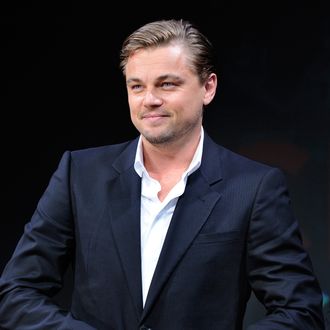 US movie actor Leonardo DiCaprio smiles as he adjust his jacket during a press conference to promote his latest film 'Inception' in Tokyo on July 21, 2010. The new movie will be shown all over Japan from July 23. AFP PHOTO/Toru YAMANAKA (Photo credit should read TORU YAMANAKA/AFP/Getty Images)
