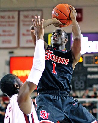 St. John's Phil Greene (1) shoots against South Carolina's Brenton Williams during their NCAA college basketball game, Thursday, Nov. 29, 2012, in New York. St. John's won 89-65.