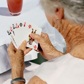 Senior Woman Playing Cards