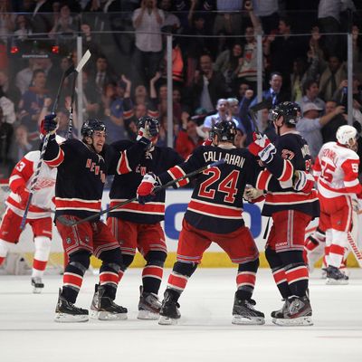 Ryan Callahan #24 of the New York Rangers celebrates his game winning goal at 2:42 of overtime to defeat the Detroit Red Wings 2-1 at Madison Square Garden on March 21, 2012 in New York City. 