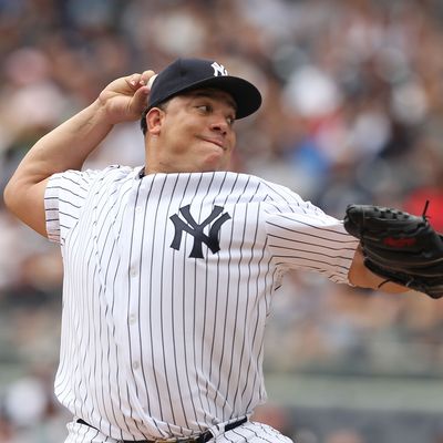 NEW YORK, NY - JULY 24: Bartolo Colon #40 of the New York Yankees pitches against the Oakland Athletics during their game on July 24, 2011 at Yankee Stadium in the Bronx borough of New York City. (Photo by Al Bello/Getty Images)