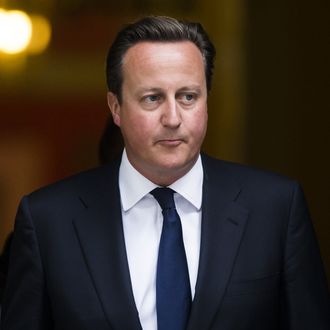 British Prime Minister David Cameron Leaves Downing Street on August 29, 2013 in London, England. Prime Minister David Cameron has recalled Parliament to debate the UK's response to a suspected chemical weapon attack in Syria. 