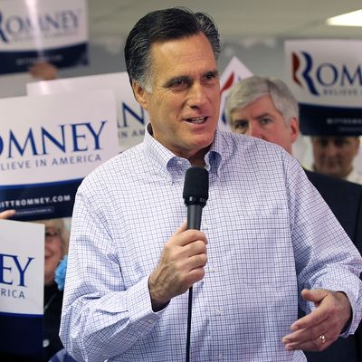 LIVONIA, MI - FEBRUARY 28: Republican presidential candidate and former Massachussetts Gov. Mitt Romney speaks during a press availability following a visit to his Michigan campaign headquarters on February 28, 2012 in Livonia, Michigan. Romney visted his Michigan campaign headquarters an primary day as Michigan residents go to the polls to vote for their choice in the Republican presidential race. (Photo by Justin Sullivan/Getty Images)