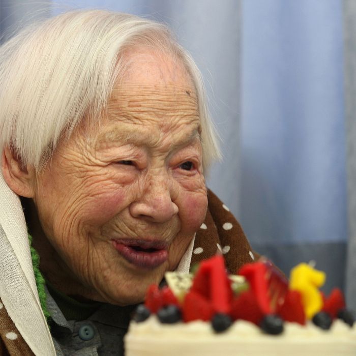 Misao Okawa, who is recognised by Guinness World Records as the world's oldest woman, receives a birthday cake during her 115th birthday celebrations at Kurenai Nursing Home on March 5, 2013 in Osaka, Japan. Misao Okawa, was born in Tenma, Osaka, on March 5, 1898. A descendent of Kimono merchants, she married in 1919 and had three children, of which a daughter and a son are still alive, and four grandchildren and six great-grandchildren.