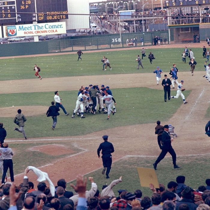 New York Mets - Tug McGraw gets a champagne shower from Ed