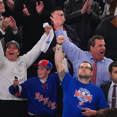 Andrew Christie, Patrick Christie, Joba Chamberlain and New Jersey Governor Chris Christie attend the Ottawa Senators vs the New York Rangers Playoff Game at Madison Square Garden on April 26, 2012 in New York City. 