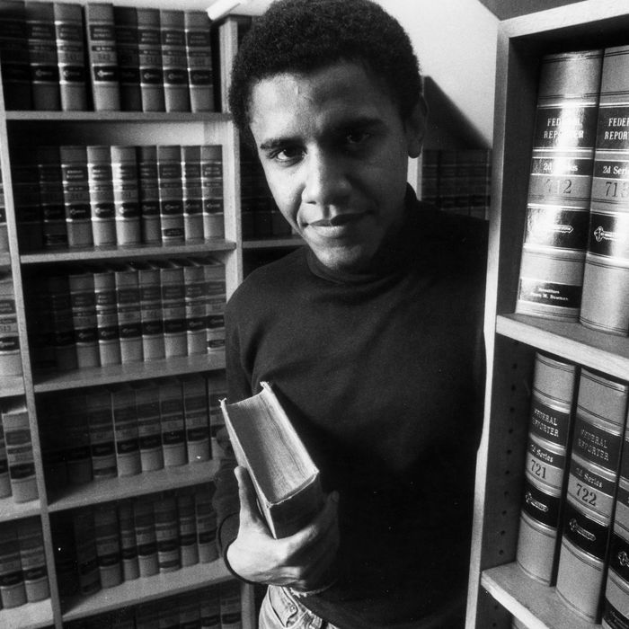 Barack Obama poses in the office of The Harvard Law Review on Monday, Feb. 5, 1990, after being named President of The Harvard Law Review.