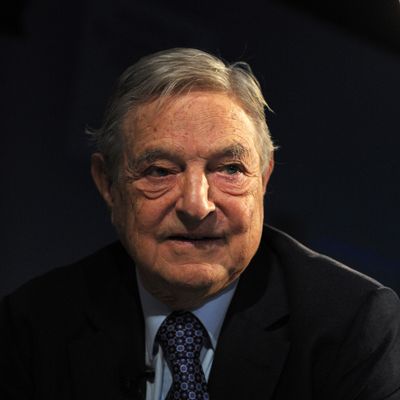 Soros Fund Management Chairman George Soros poses on January 26, 2013, during the World Economic Forum (WEF) meeting in the Swiss resort of Davos. The WEF will see top politicians and business leaders pursue talks on whether they have seen the back of the global financial crisis. 