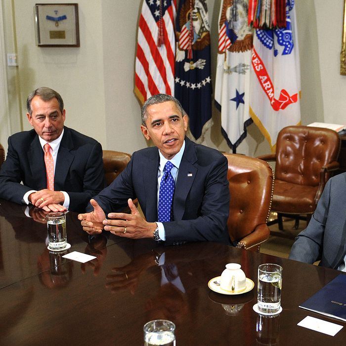 U.S. President Barack Obama (2nd L) speaks as U.S. Treasury Secretary Tim Geithner (L), Speaker of the House John Boehner (R-OH) (2nd L) and Senate Majority Leader Harry Reid (D-NV) looks on during a meeting with bipartisan group of congressional leaders in the Roosevelt Room of the White House on November 16, 2012 in Washington, DC. Obama and congressional leaders of both parties are meeting to reportedly discuss deficit reduction before the tax increases and automatic spending cuts go into affect in the new year.