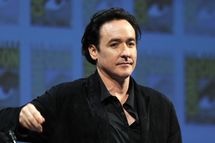 SAN DIEGO, CA - JULY 22:  Actor John Cusack speaks at "The Raven" Panel during Comic-Con 2011 on July 22, 2011 in San Diego, California.  (Photo by Kevin Winter/Getty Images)