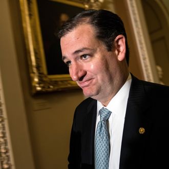 US Senator Ted Cruz walks to a meeting with Senate Republicans on Capitol Hill October 16, 2013 in Washington, DC. US senators scrambled together an eleventh hour compromise Wednesday that they hoped might protect Washington's battered financial standing by heading off fears of a default. The Senate deal must still pass a divided and unpredictable House of Representatives, but lawmakers were hopeful it will allow the US government to reopen and keep borrowing to meet its obligations. AFp PHOTO/Brendan SMIALOWSKI (Photo credit should read BRENDAN SMIALOWSKI/AFP/Getty Images)