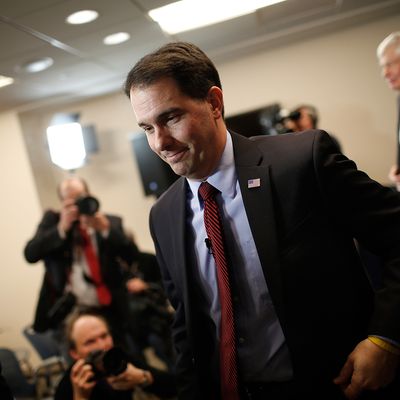 GWisconsin Governor Scott Walker departs after speaking at the American Action Forum January 30, 2015 in Washington, DC. Earlier in the week Walker announced the formation of 