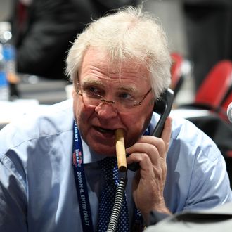 MONTREAL, QC - JUNE 27: General Manager and President Glen Sather of the New York Rangers works the phones during the 2009 NHL Entry Draft at the Bell Centre on June 27, 2009 in Montreal, Quebec, Canada. (Photo by Bruce Bennett/Getty Images) *** Local Caption *** Glen Sather