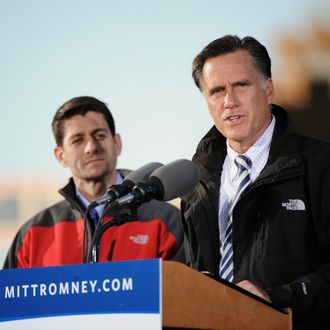 LANCASTER, OH - OCTOBER 12: Republican presidential candidate, former Massachusetts Gov. Mitt Romney (R) and Republican vice presidential candidate, U.S. Rep. Paul Ryan (R-WI) speak on stage at a rally on October 12, 2012 in Lancaster, Ohio. The two were campaigning a day after Ryan's debate with U.S. Vice President Joe Biden. (Photo by Jamie Sabau/Getty Images)