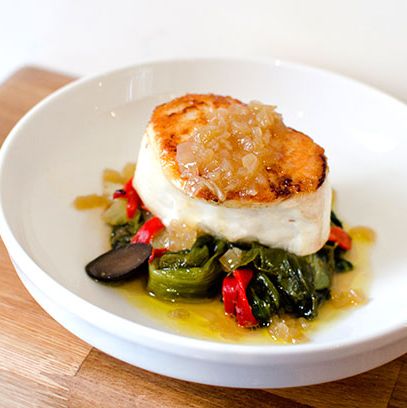 Chatham cod with escarole, olives, lemon, peppers, and onion vinaigrette.