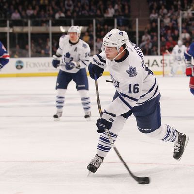 NEW YORK, NY - OCTOBER 27: Clarke MacArthur #16 of the Toronto Maple Leaves scores a goal against the New York Rangers at Madison Square Garden on October 27, 2011 in New York City. (Photo by Nick Laham/Getty Images)