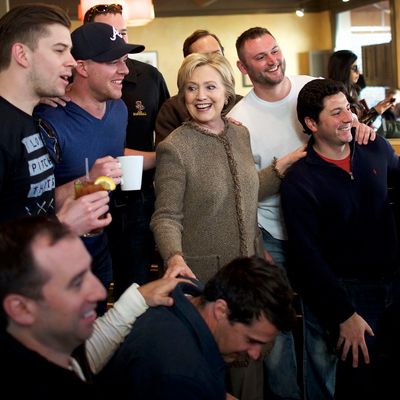 Hillary Clinton, with a bunch of men right where she likes 'em.