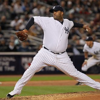 NEW YORK, NY - OCTOBER 06: CC Sabathia #52 of the New York Yankees throws a pitch against the Detroit Tigers during Game Five of the American League Championship Series at Yankee Stadium on October 6, 2011 in the Bronx borough of New York City. (Photo by Nick Laham/Getty Images)