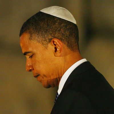 Democratic presidential candidate Sen. Barack Obama pays his respects in the Hall Of Remembrance during a visit to the Yad Vashem Holocaust Museum, on July 23, 2008 in Jerusalem, Israel. Obama continued his tour of the middle east with a visit to the Yad Vashem Holocaust Museum, which commemorates the six million Jewish Holocaust victims killed by the Nazis during World War II. (Photo by Daniel Berehulak/Getty Images)