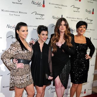 (L-R) Television personalities Kim Kardashian, Kourtney Kardashian, Khloe Kardashian and Kris Jenner arrive at the grand opening of the Kardashian Khaos store at the Mirage Hotel & Casino December 15, 2011 in Las Vegas, Nevada.