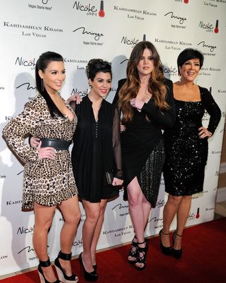 (L-R) Television personalities Kim Kardashian, Kourtney Kardashian, Khloe Kardashian and Kris Jenner arrive at the grand opening of the Kardashian Khaos store at the Mirage Hotel & Casino December 15, 2011 in Las Vegas, Nevada.