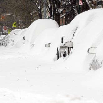 A man walks through the snow in Manhattan's East Village December 27, 2010 in New York City. 