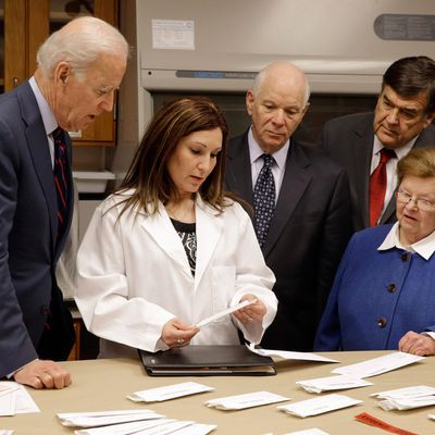Joe Biden looks over a backlog of rape kits. 