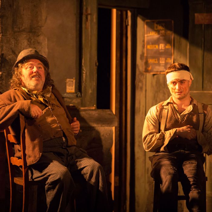 THE CRIPPLE OF INISHMAAN(l-r) Pat Shortt (Johnnypateenmike) and Daniel Radcliffe (Billy) in THE CRIPPLE OF INISHMAAN, by Martin McDonagh, directed by Michael Grandage. Previews April 12, opening April 20 at the Cort Theatre (138 West 48th Street).? Johan Persson