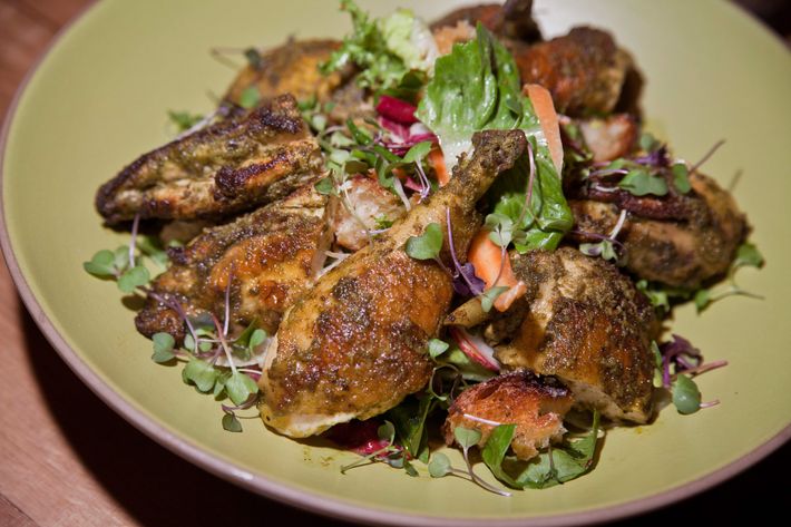 Herb-roasted chicken with crouton salad.