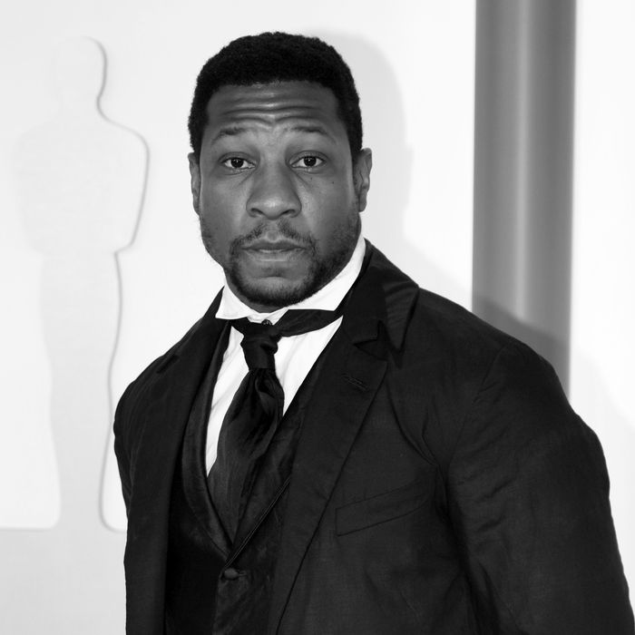 Actor Jonathan Majors wearing a suit.