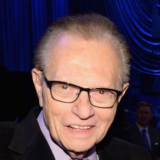 Larry King and David Spade attend 