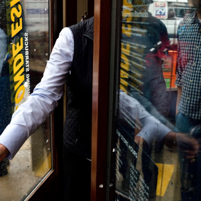Corporate employees lock the door after an estimated fifty wrapped up a three-hour long protest at the Starbucks location in Center City Philadelphia, PA, USA on April 16, 2018. (Photo by Bastiaan Slabbers/NurPhoto)