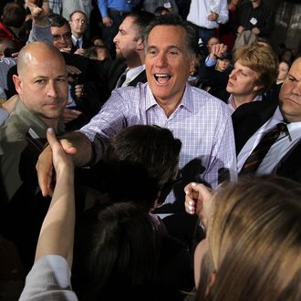 DAYTON, OH - MARCH 03: Republican presidential candidate, former Massachusetts Gov. Mitt Romney greets supporters during a campaign rally at US Aeroteam on March 3, 2012 in Dayton, Ohio. Mitt Romney is campaigning in Ohio ahead of Super Tuesday. (Photo by Justin Sullivan/Getty Images)