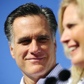 Republican presidential hopeful Mitt Romney listens to his wife Ann introducing him prior to deliver a speech at Paramount Printing, a company going out of business, in Jacksonville, Florida, January 26, 2012. Florida will hold its Republican primary on January 31, 2012. AFP PHOTO/Emmanuel Dunand (Photo credit should read EMMANUEL DUNAND/AFP/Getty Images)