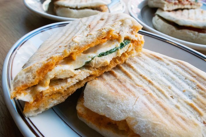 Roast-chicken panino with mozzarella, arugula, and spicy mayo.