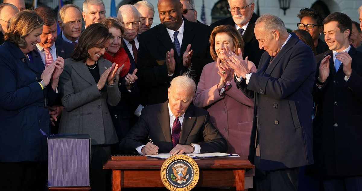 Biden Signs Infrastructure Bill, Hoping To Build On His Win