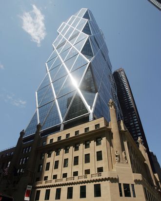 NEW YORK - JUNE 15: The new Hearst Tower stands June 15, 2006 in New York City. The new world headquarters of the Hearst Corporation opened in May and sits atop a six-story Art Deco pedestal built in 1928. (Photo by Mario Tama/Getty Images) 