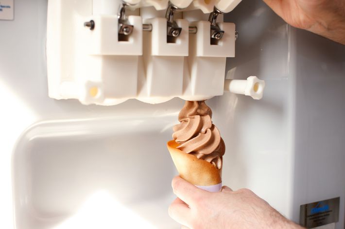 Next, he adds the Gianduja flavor atop the brittle.