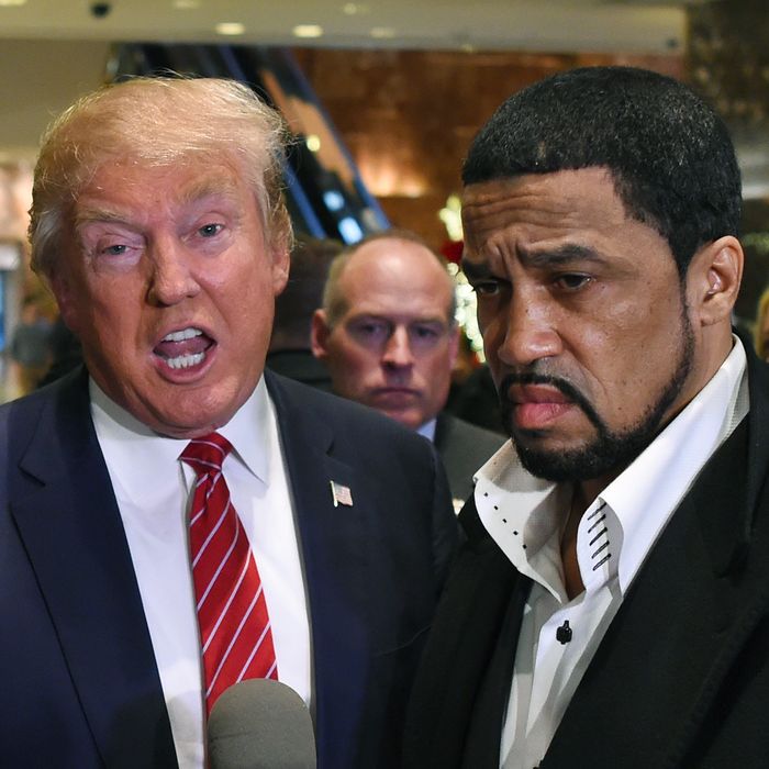 Republican Candidate Donald Trump arrives to speaks to the press with Rev. Darrell Scott(R), senior pastor of the New Spirit Revival Center in Cleveland Heights after meetings with prominent African American ministers at Trump Tower in New York November 30 ,2015.