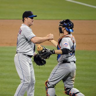 SAN DIEGO, CA - AUGUST 15: Jason Isringhausen #45 of the New York Mets, left, is congratulated by Josh Thole #30 after getting the final out in the 10th inning of a baseball game against the San Diego Padres at Petco Park on August 15, 2011 in San Diego, California. The Mets won 5-4. (Photo by Denis Poroy/Getty Images)
