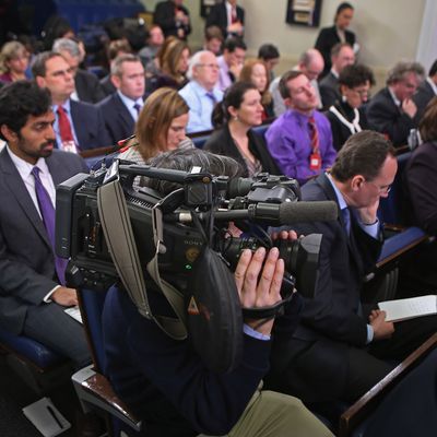 WASHINGTON, DC - JANUARY 08: Reporters listen to White House Press Secretary Jay Carney as he conducts the daily news briefing in the James Brady Press Briefing Room at the White House January 8, 2013 in Washington, DC. Carney said that the White House will not negotiate with Congress about raising the national debt ceiling. (Photo by Chip Somodevilla/Getty Images)