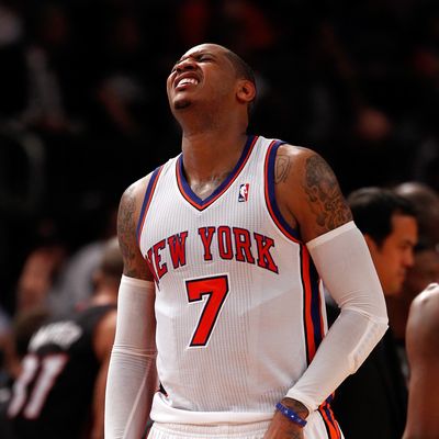 Carmelo Anthony #7 of the New York Knicks reacts in the second half against the Miami Heat in Game Three of the Eastern Conference Quarterfinals in the 2012 NBA Playoffs on May 3, 2012 at Madison Square Garden in New York City.