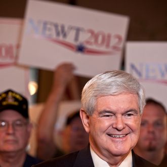 SPARTANBURG, SC - JANUARY 21: Republican presidential candidate, former Speaker of the House of Representatives Newt Gingrich speaks during a live television interview during a campaign stop at the Grapevine Restaurant on January 21, 2012 in Spartanburg, South Carolina. Voters in South Carolina will head to the polls today to vote in the primary election for the U.S. presidential candidate. (Photo by John W. Adkisson/Getty Images)