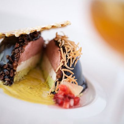 Semi frozen mousse of strawberry, pistachio and coconut with lemon pizzelle cookies