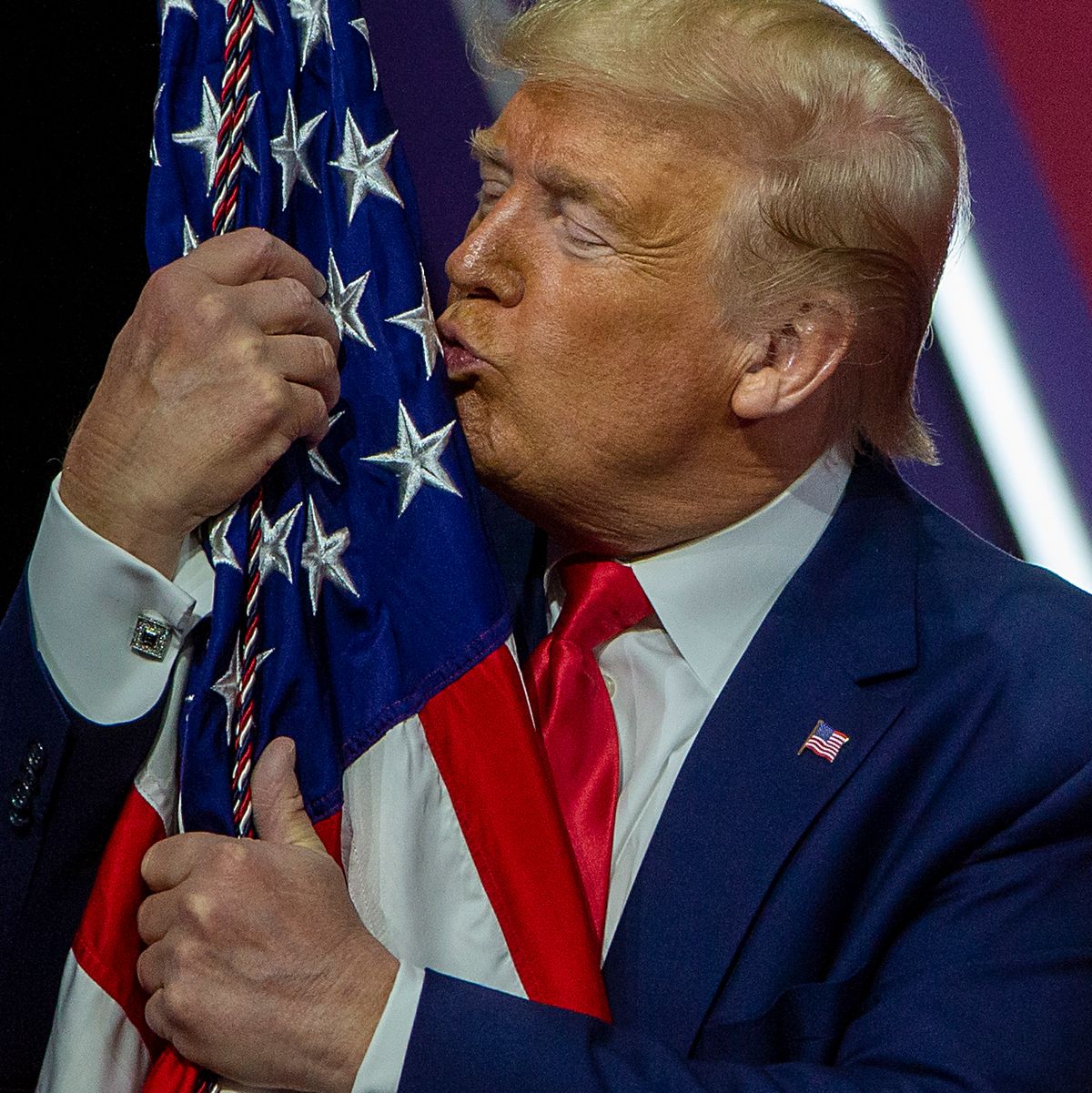 Watch Trump Fondle An American Flag At Cpac