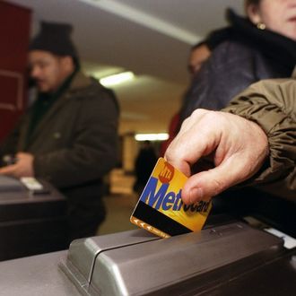 Metrocard users at the Rockefeller Center subway station. 