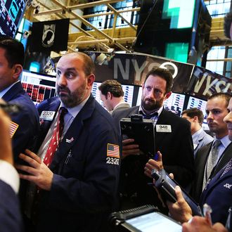 Traders work on the floor of the New York Stock Exchange on June 20, 2013 in New York City. In Wall Street's worst day of the year, the Dow Jones industrial average plunged more than 300 points, or two percent.